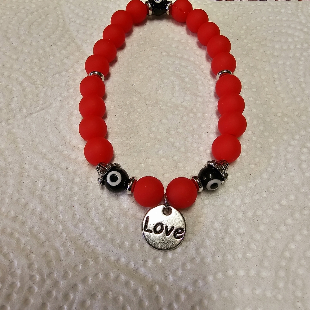 Men's charm bracelet by Kutie Pei Jewelry